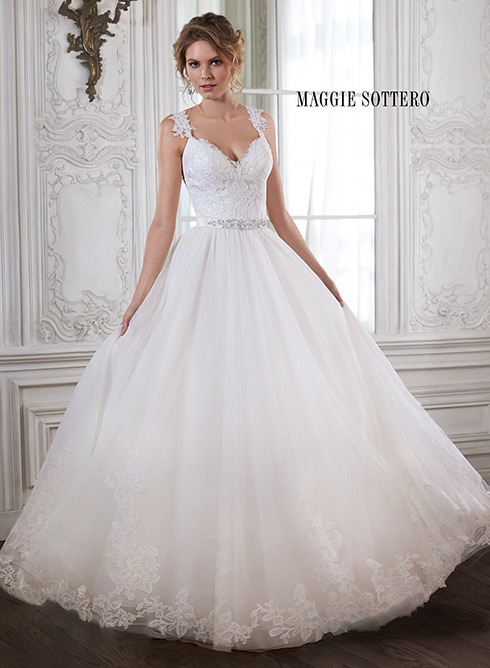 Crystal: Beautifully detailed with lace and a dazzling Swarovski crystal belt, the fitted bodice of this ballgown cascades into a romantic tulle skirt. Complete with V-neckline and cap-sleeves. Available with optional beaded belt or grosgrain ribbon belt.