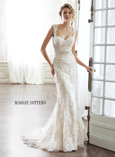 Pia: The pinnacle of romance is found in this streamlined sheath rendered in exquisite lace. Complete with dramatic V-back beautifully detailed with illusion lace, sweetheart neckline and delicate cap-sleeves.